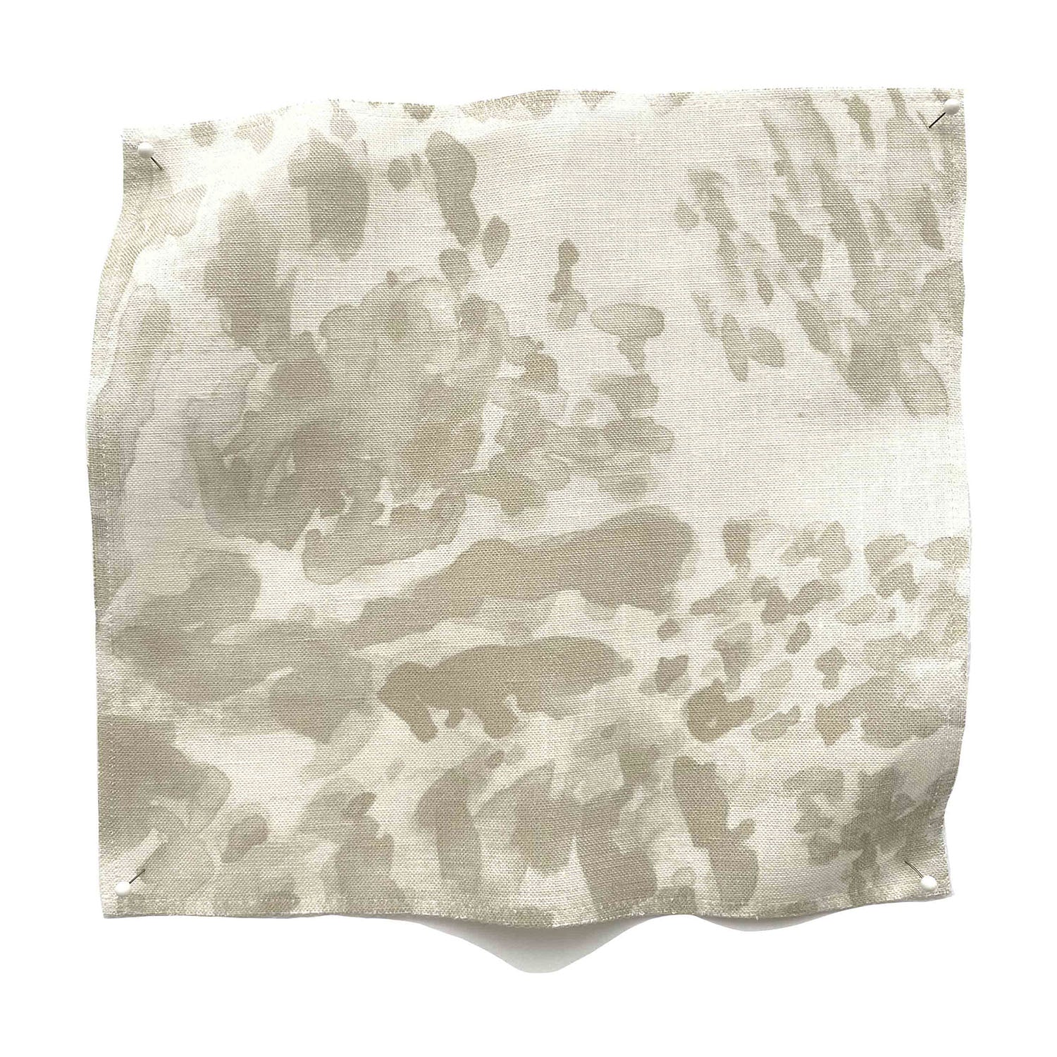 Square fabric swatch in a painterly cloud print in shades of tan on a cream field.