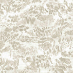 Detail of fabric in a painterly cloud print in shades of tan on a cream field.