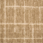 Textured carpet with a checkered pattern in tan and beige tones.