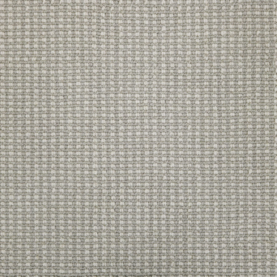 Broadloom carpet swatch in a textured pattern in a grey design