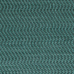 Detail of a woven leather rug in a herringbone pattern in dark green with turquoise accents.