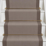 Herringbone flatweave runner in grey and brown on white staircase