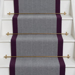 Herringbone flatweave runner in grey and purple on white staircase