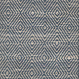 Broadloom sample in a dimensional diamond pattern in blue and ivory.