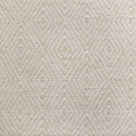 Broadloom sample in a dimensional diamond pattern in cream and ivory.