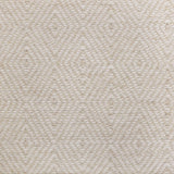 Broadloom sample in a dimensional diamond pattern in cream and ivory.