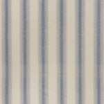 printed cotton fabric in an irregular stripe pattern in blue on a cream field.