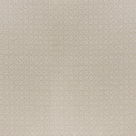 printed cotton fabric in a floral gridded honeycomb pattern in white on a beige field.