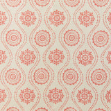 Detail of fabric in a playful floral stripe in orange on a cream field.