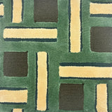 Handtufted rug sample in a contemporary basketweave pattern in shades iv green, grey and ivory.