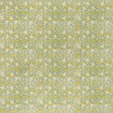 printed linen fabric in a painterly floral pattern in mustard and blue on a cream field.