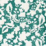 Printed linen in a white floral silhouette motif on emerald green field. 