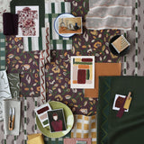 Collage of various patterns and textures with a focus on purples, orange and green.