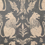 Close-up of wallpaper in a lion and plant print in cream on a mottled gray field.