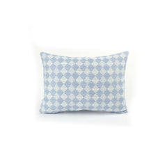 Back view of a rectangular throw pillow with a repeating blue and white diamond pattern.