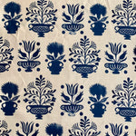 Detail of fabric in a repeating vase and plant print in navy on a cream field.