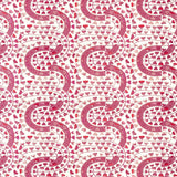 Detail of wallpaper in a meandering botanical stripe in shades of pink and red on a white field.