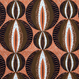 Detail of fabric in an interlocking circular stripe print in shades of orange, brown and black on an orange field.