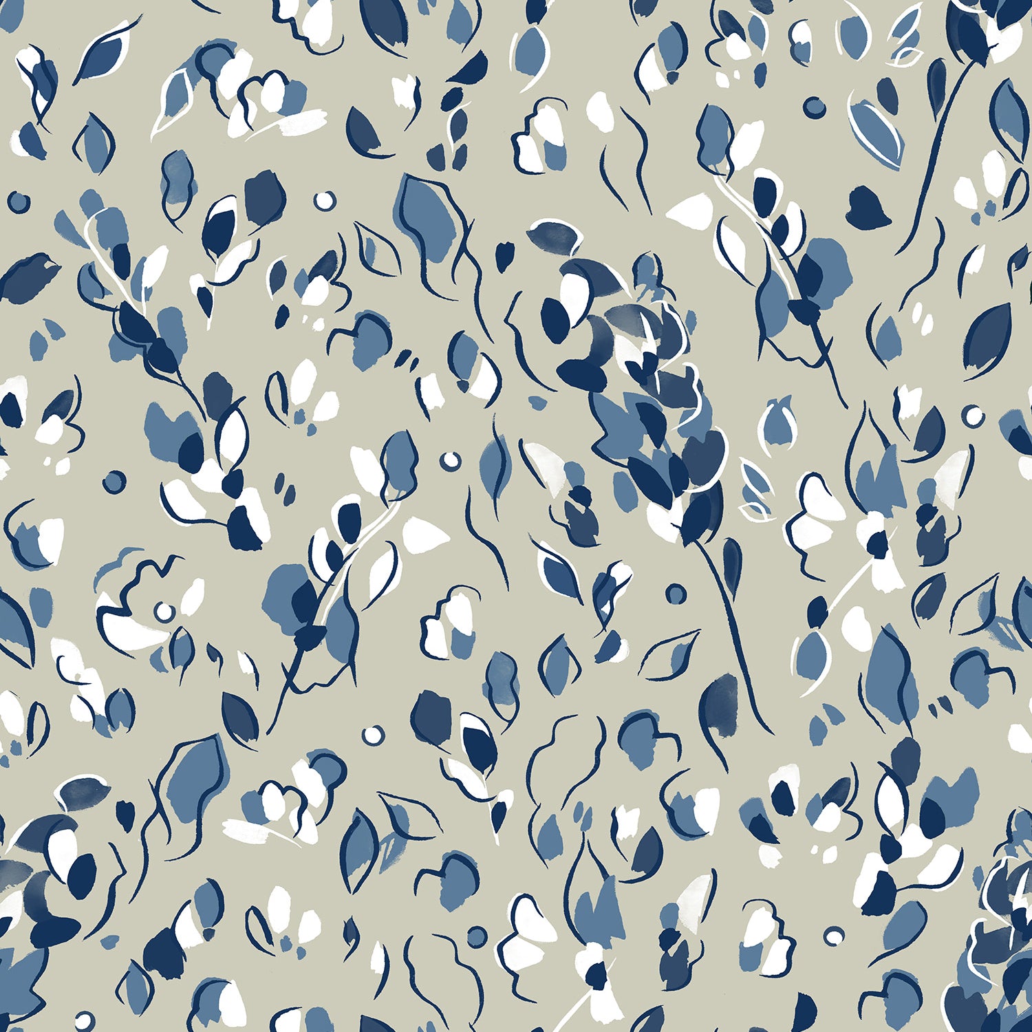 Detail of fabric in a painterly leaf print in shades of white, blue and navy on a tan field.