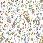 Detail of fabric in a painterly leaf print in a rainbow of shades on a white field.