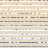 Detail of wallpaper in an undulating stripe pattern in gray, white and tan.