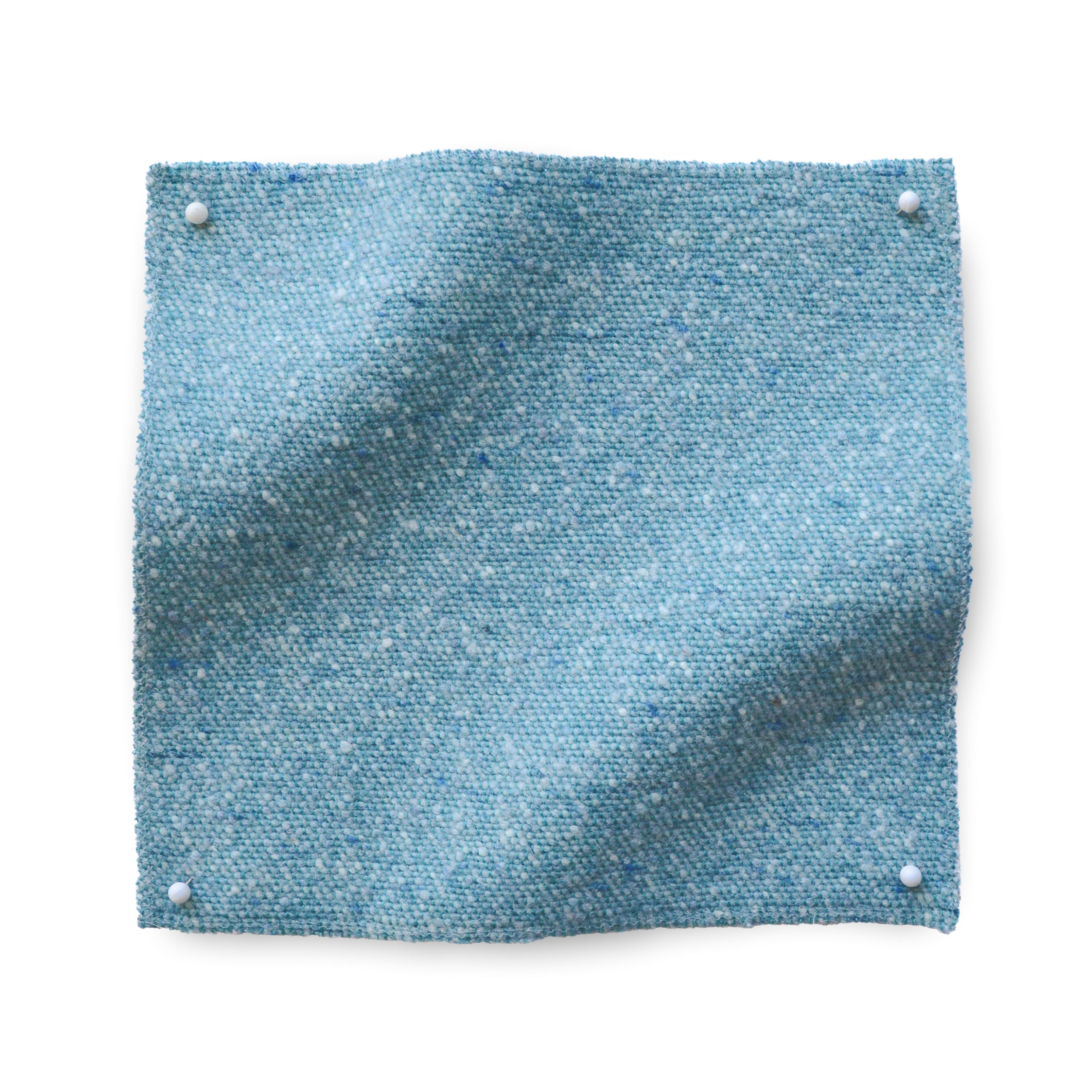 Square fabric swatch of heathered wool in a light blue colorway.