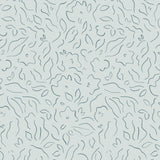 Detail of wallpaper in a minimalist floral print in navy on a turquoise field.