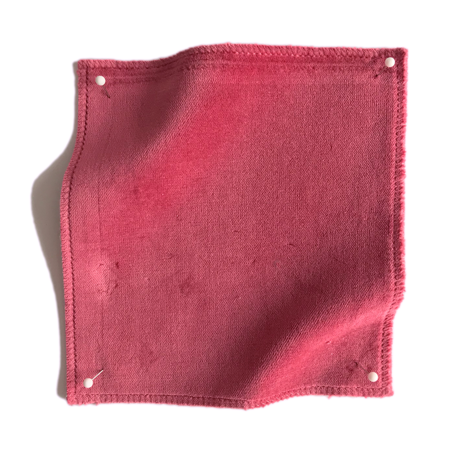 Square fabric swatch of velvet in a dark pink colorway.