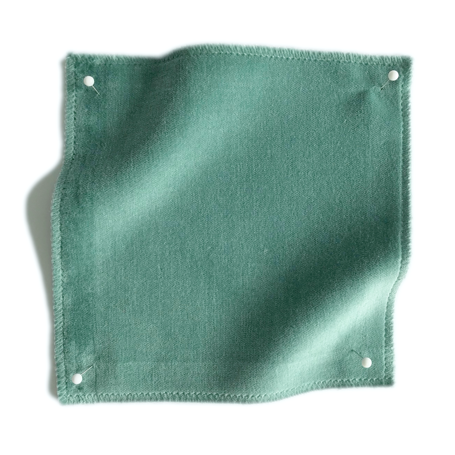 Square fabric swatch of velvet in a blue-green colorway.