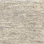 Textural bouclé broadloom carpet in soft taupe.