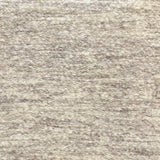 Textural bouclé broadloom carpet in soft taupe.