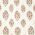 Detail of fabric in a floral paisley print in shades of red, pink and green on a cream field.