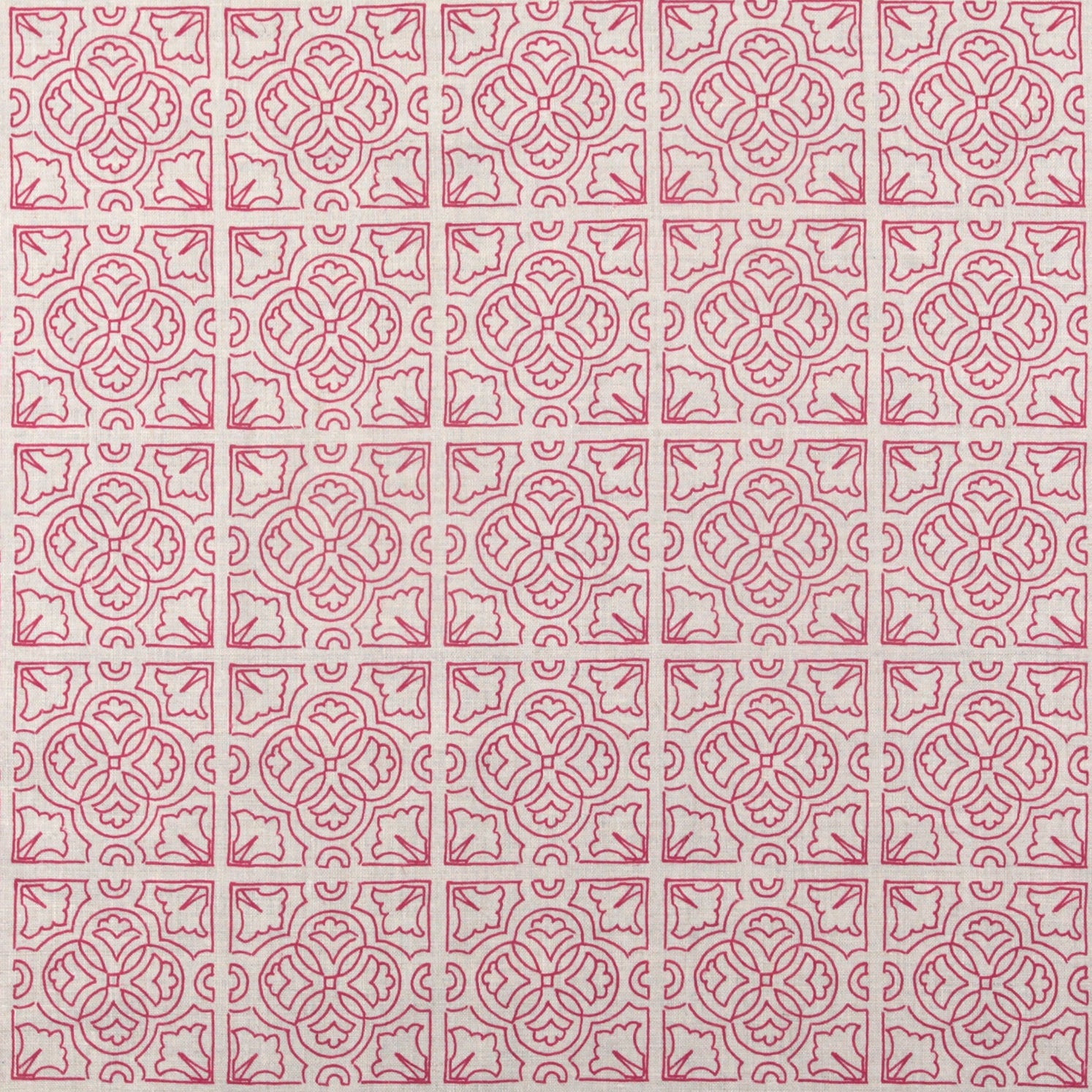 Detail of fabric in a damask lattice print in magenta on a cream field.