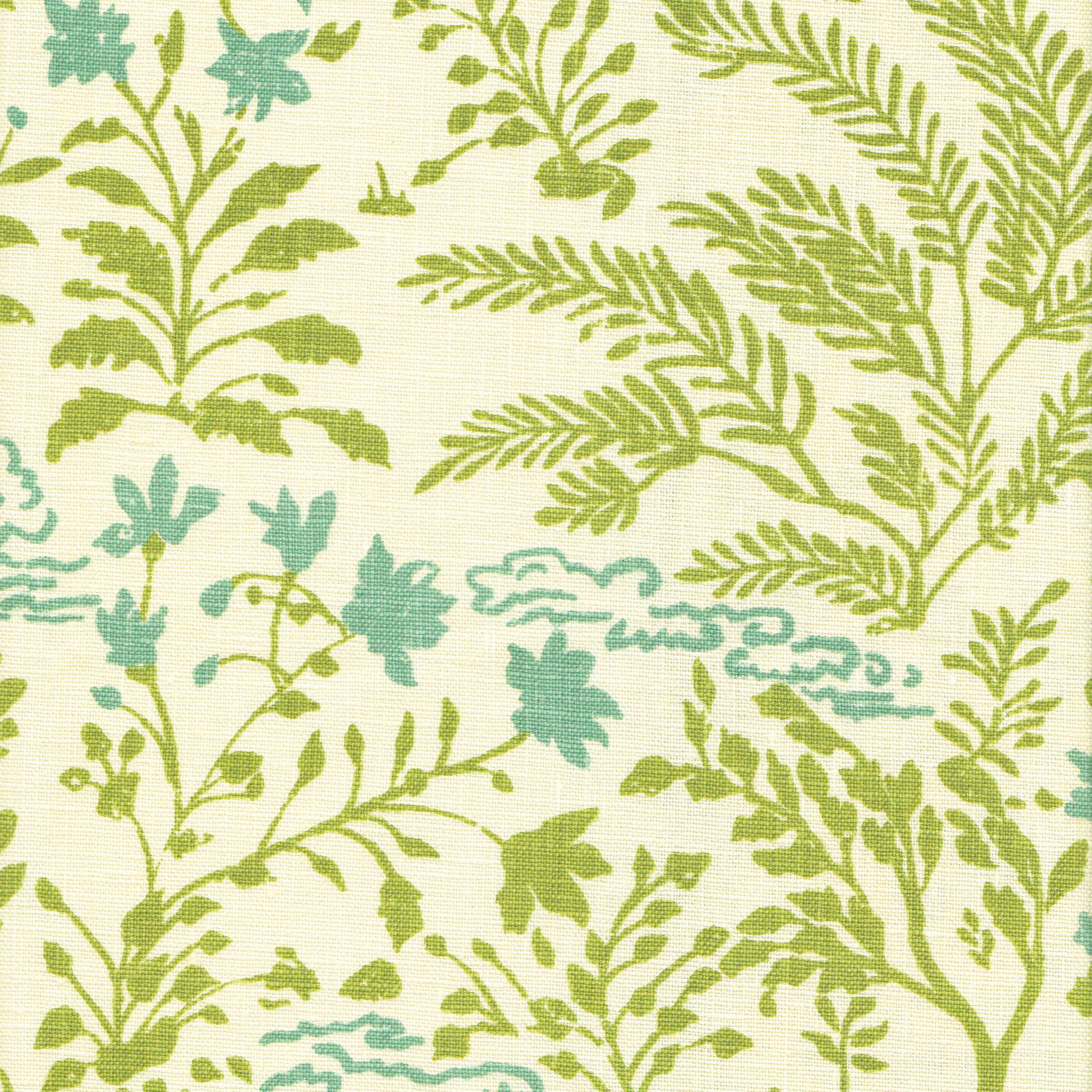 Detail of fabric in a botanical and cloud print in green and blue on a cream field.