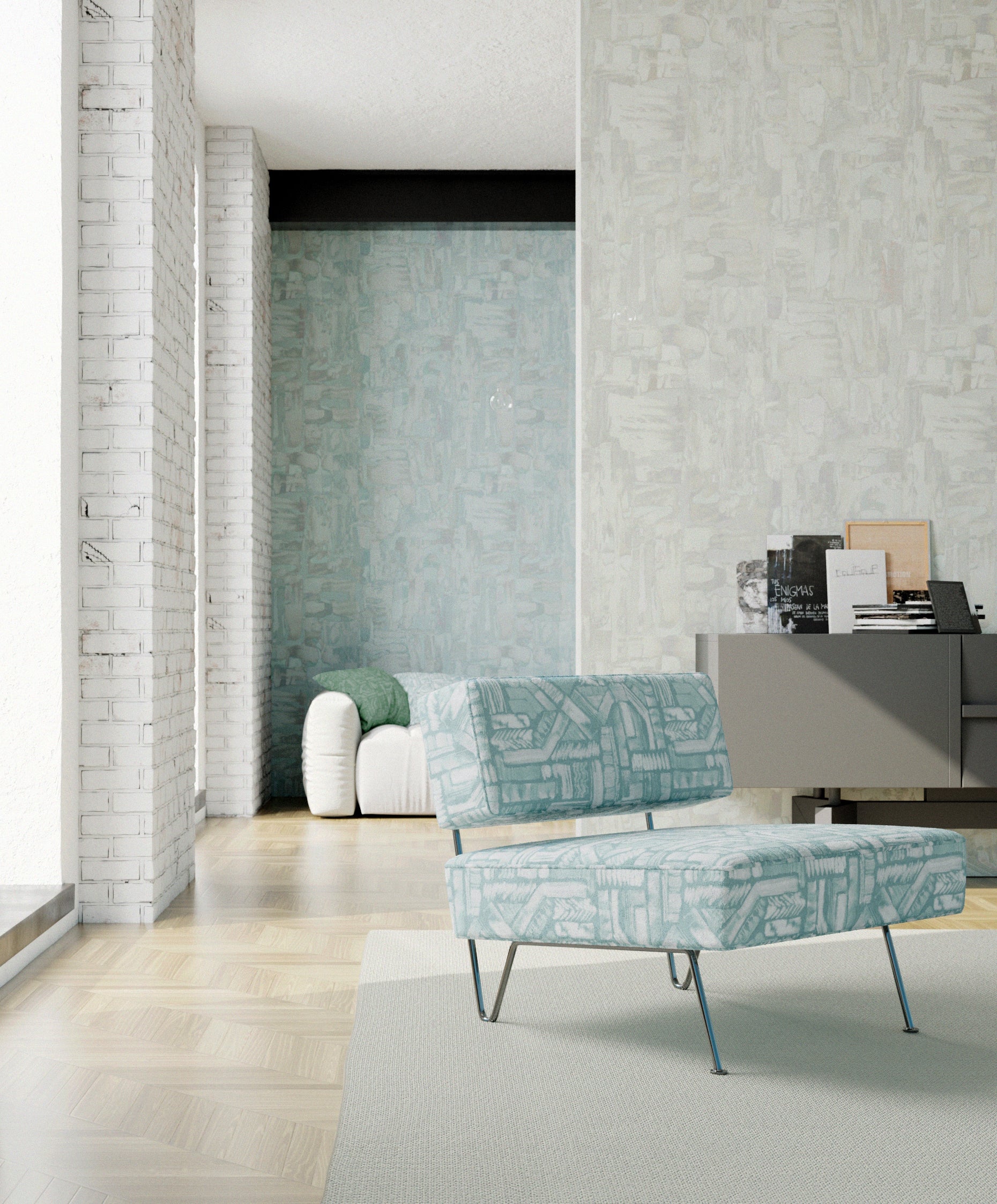 A minimalist living space with an armchair upholstered in a geometric pattern in turquoise.