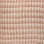 Detail of fabric in a repeating triangle print in dusty brown on a tan field.