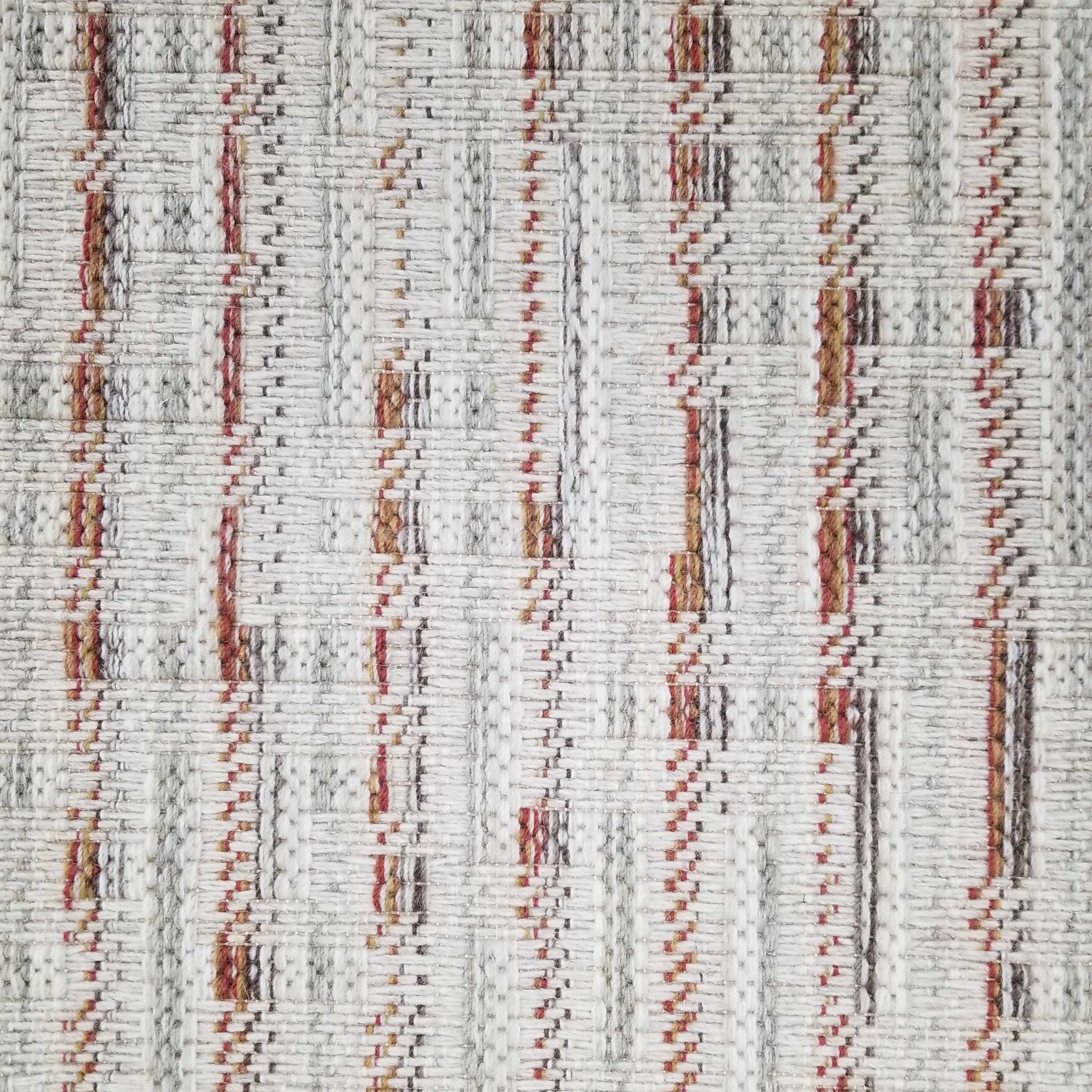 Textured carpet with vertical stripes in brown, gray, and beige on a white background