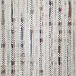 Textured broadloom with vertical stripes in orange and navy.