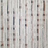 Textured broadloom with vertical stripes in orange and navy.