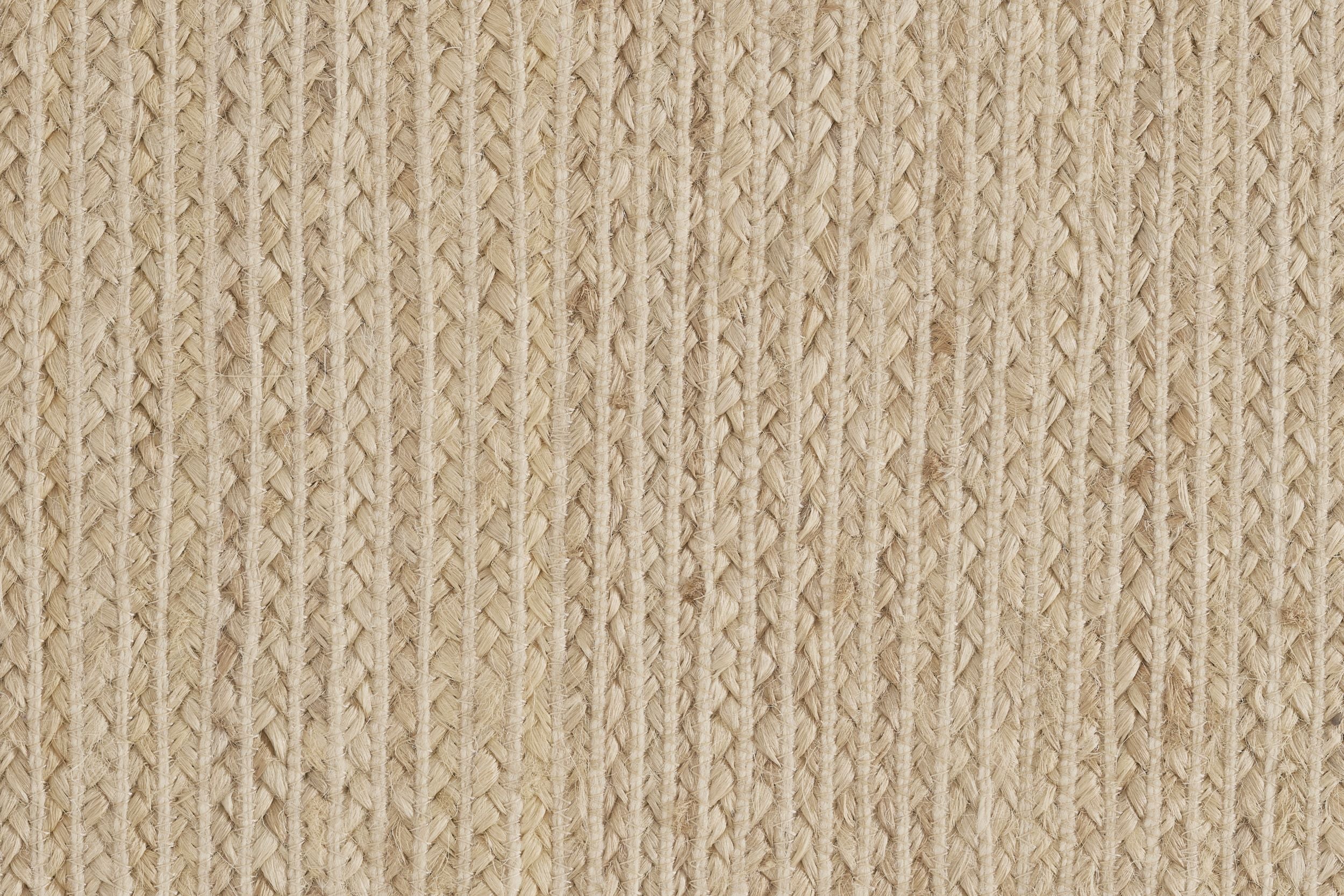 Broadloom carpet sample in braided texture in cream. 