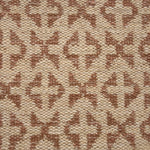 Handwoven rug detail in a contemporary design in brown and beige 