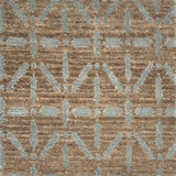 Handknotted rug with grey linear design on a heather brown field. 