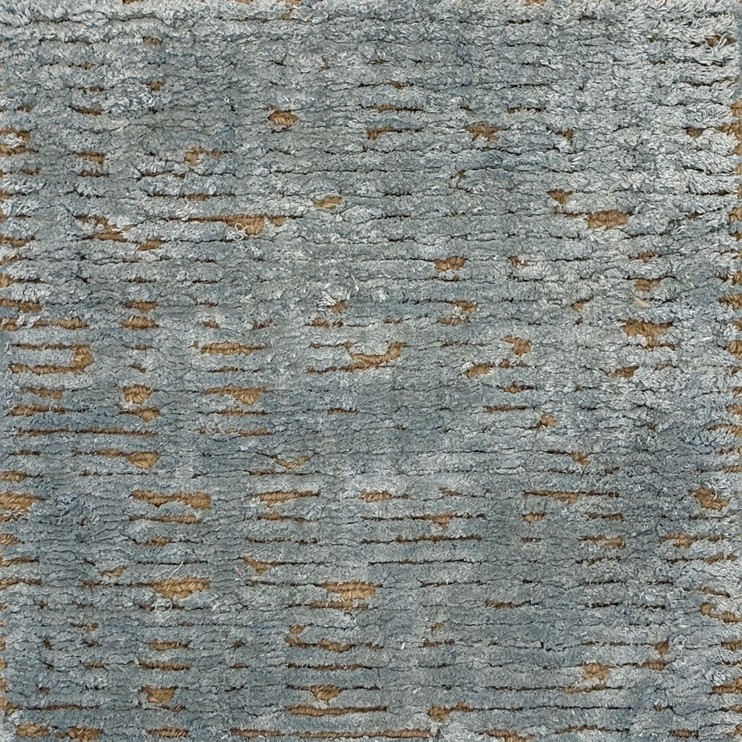 Textured slate blue and tan  handknotted rug