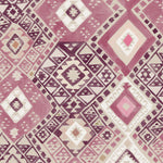 Detail of fabric in a painterly diamond print in shades of pink, tan and white.