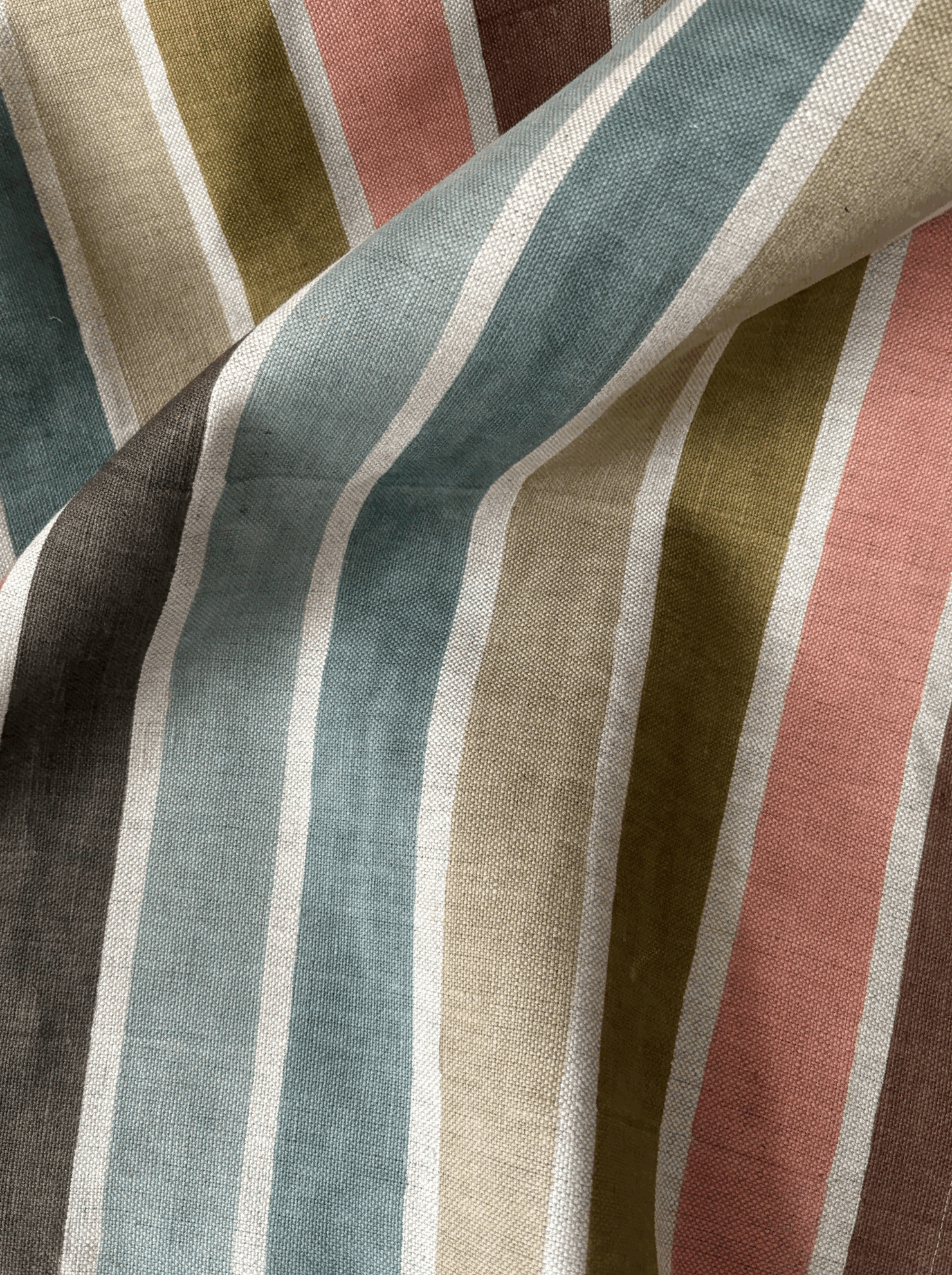 Close-up of striped fabric with multicolor pattern