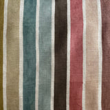 Striped fabric with a pattern of multicolored vertical stripes.