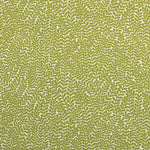 Detail of fabric in a scrolling stem and leaf print in lime on a cream field.