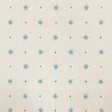 Detail of wallpaper in a bordered teardrop print in blue on a cream field.