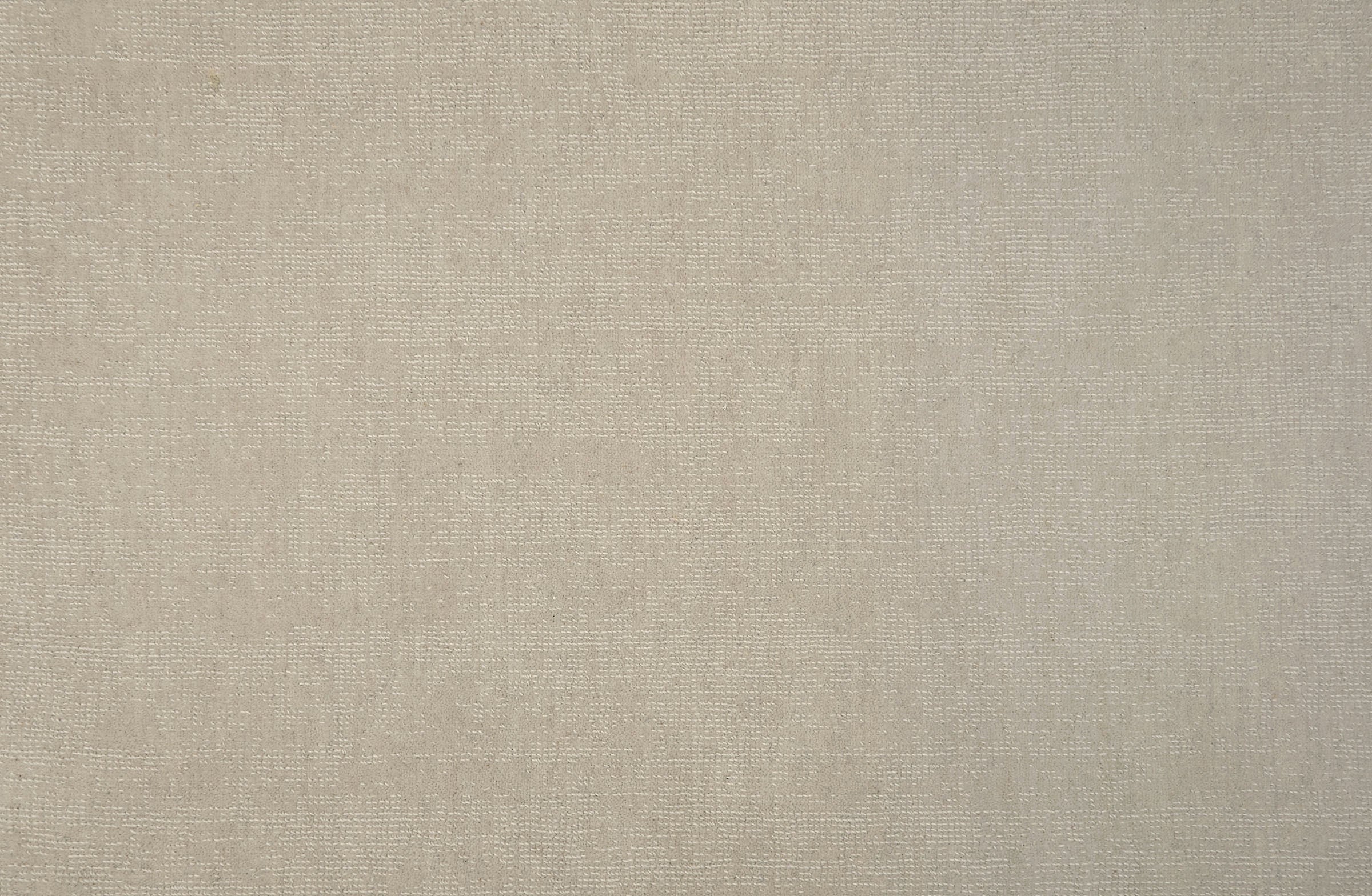 Solid broadloom carpet in ivory.