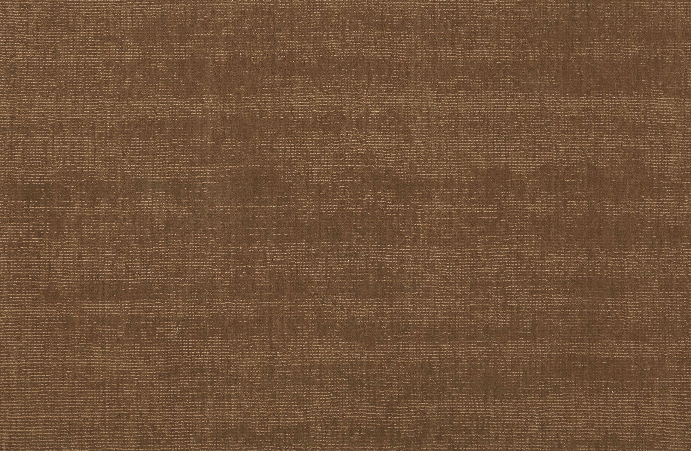 Solid broadloom carpet in warm brown.